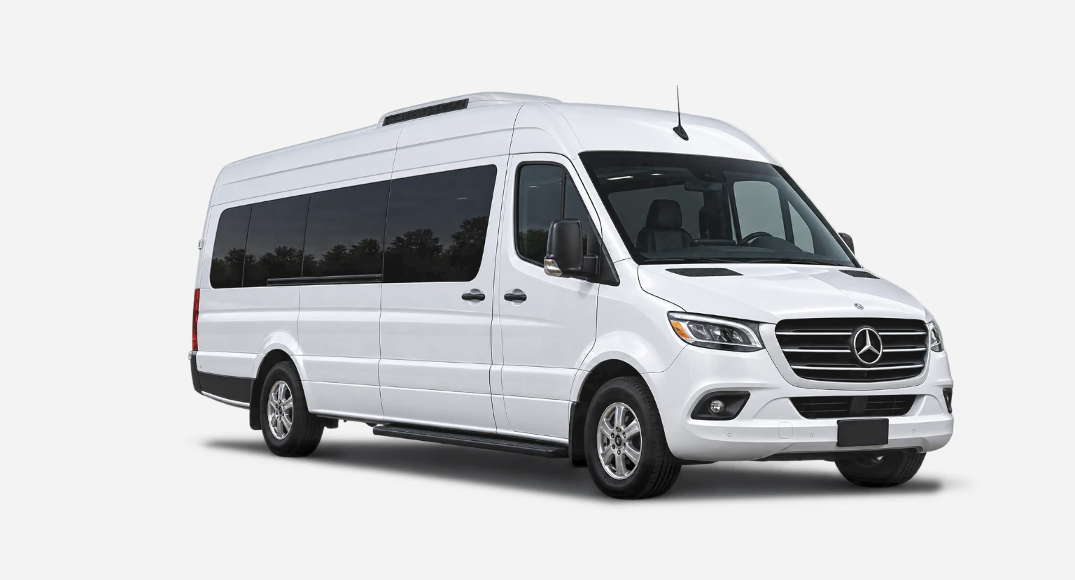 White 10-passenger executive Sprinter van